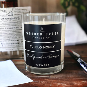 Tupelo Honey Candle with song lyrics and ink pen