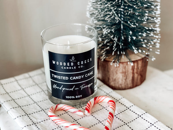 Close-up view of Twisted Candy Cane candle with candy canes